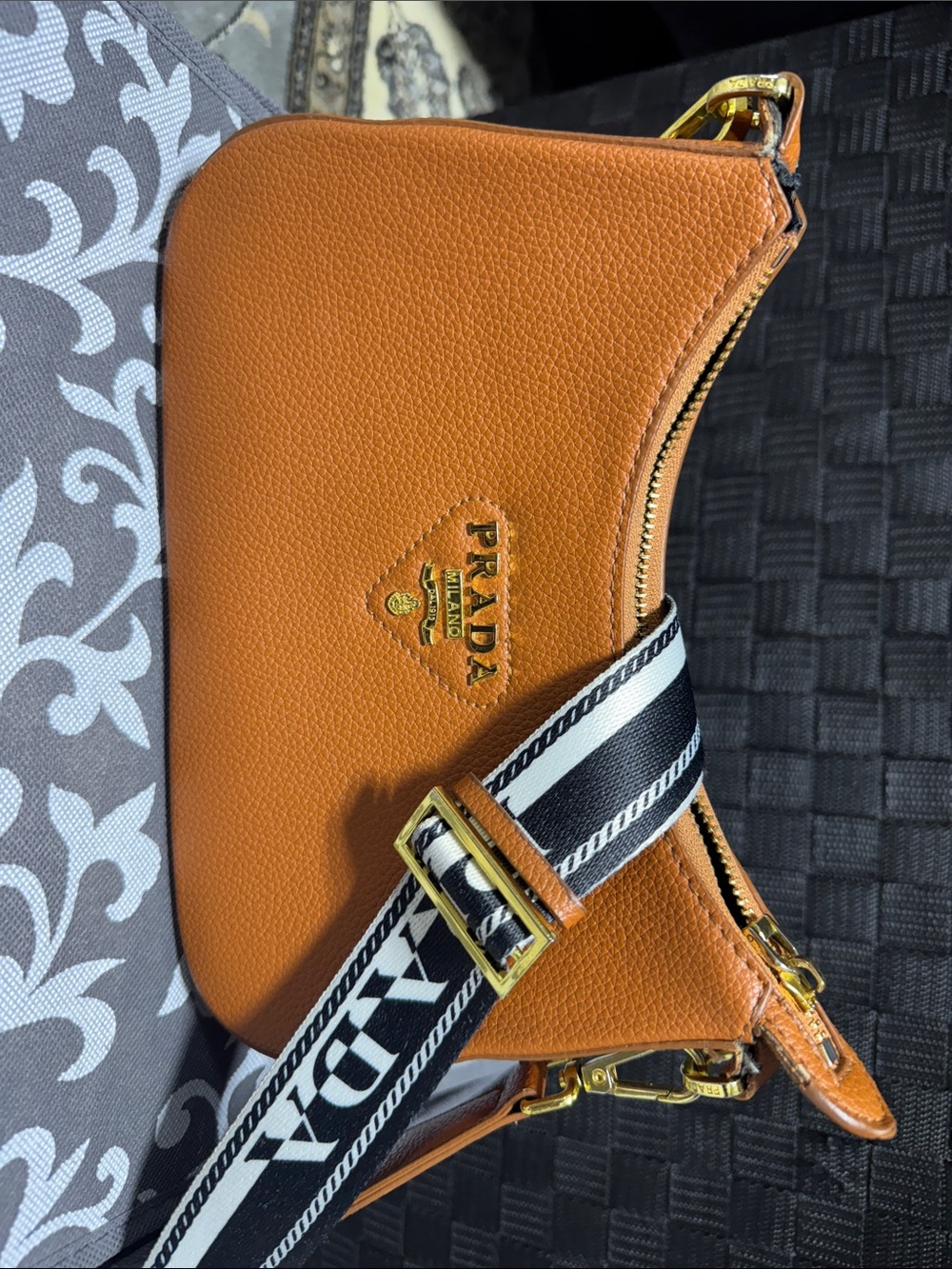 Prada Orange Saffiano Leather Crossbody with Black-and-White Logo Strap